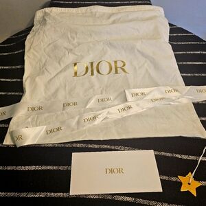 Authentic Dior Dust bags, metal charm, ribbon & gift bag.
